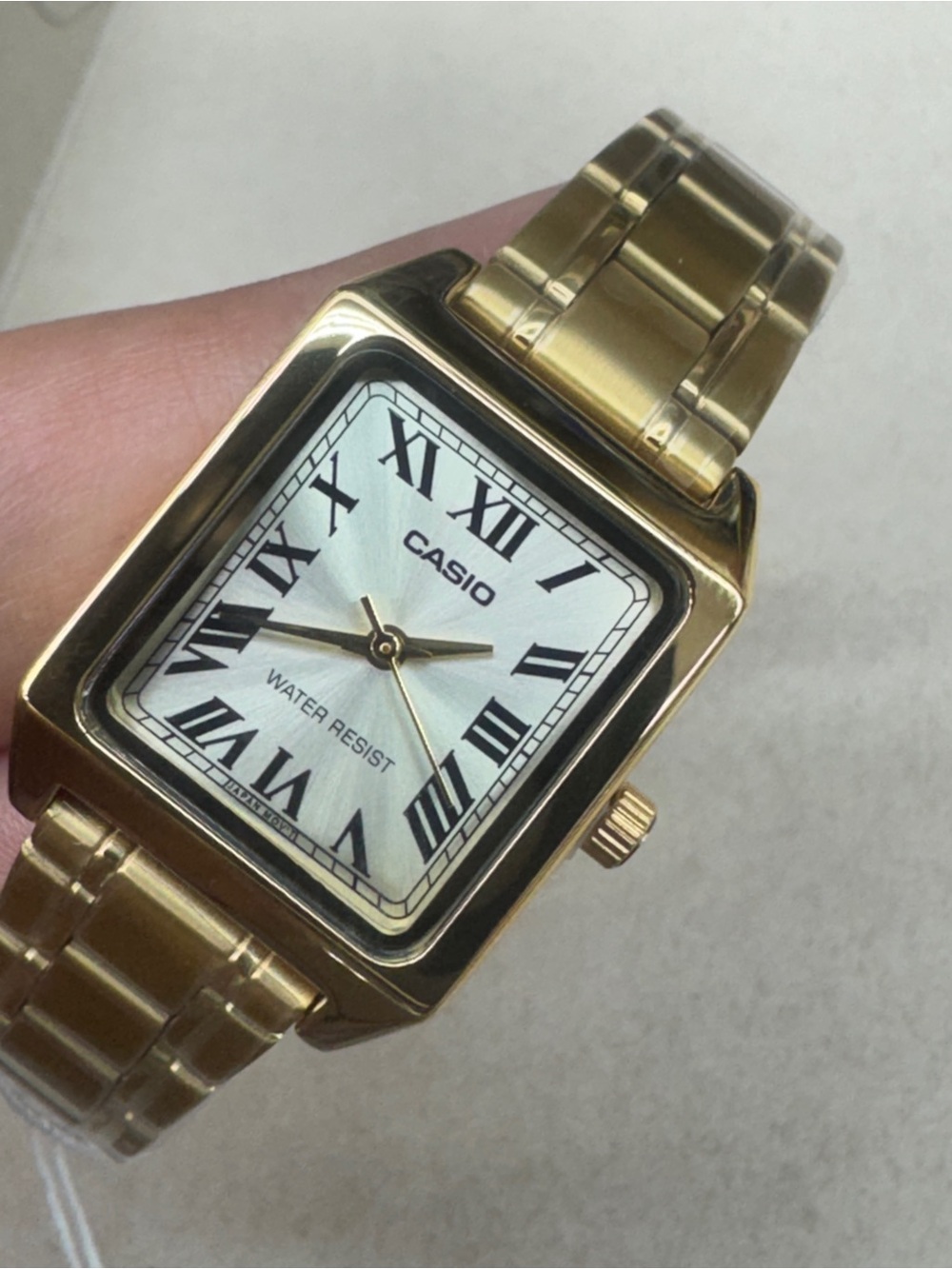 Casio Gold Tone Square Watch with White Dial and Roman Numerals